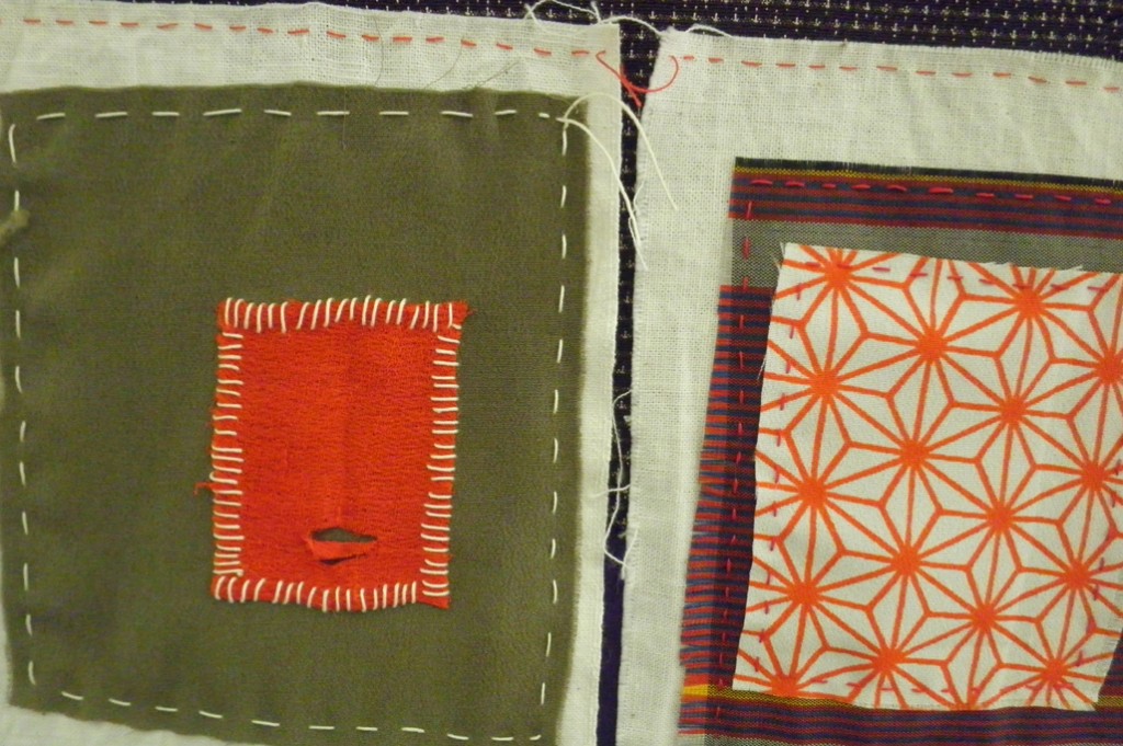 various colours of rectangular shapes handstitched in layers