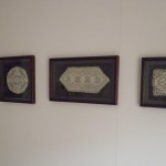 paintings of lace doilies framed